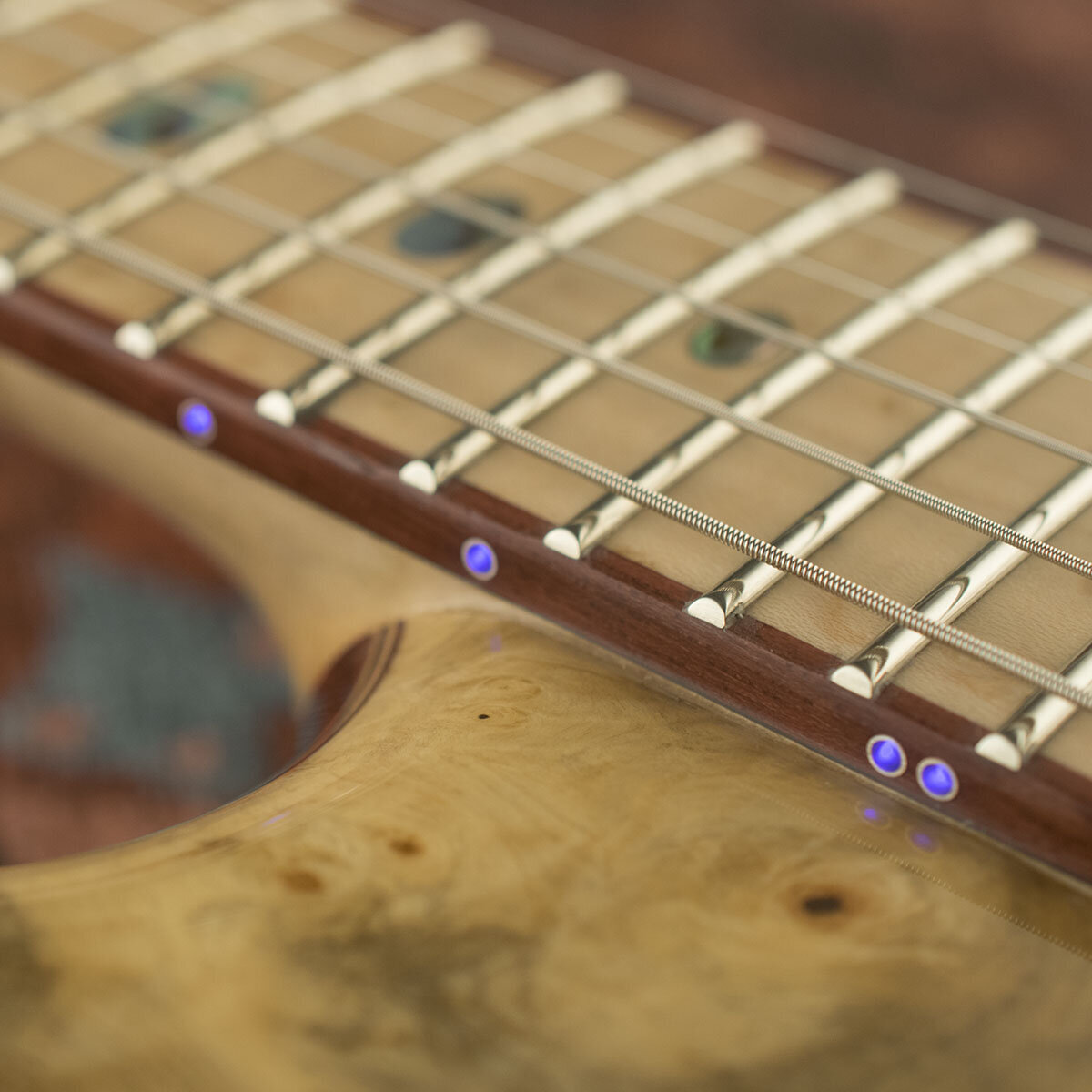 Purpleheart binding on Maple fingerboard