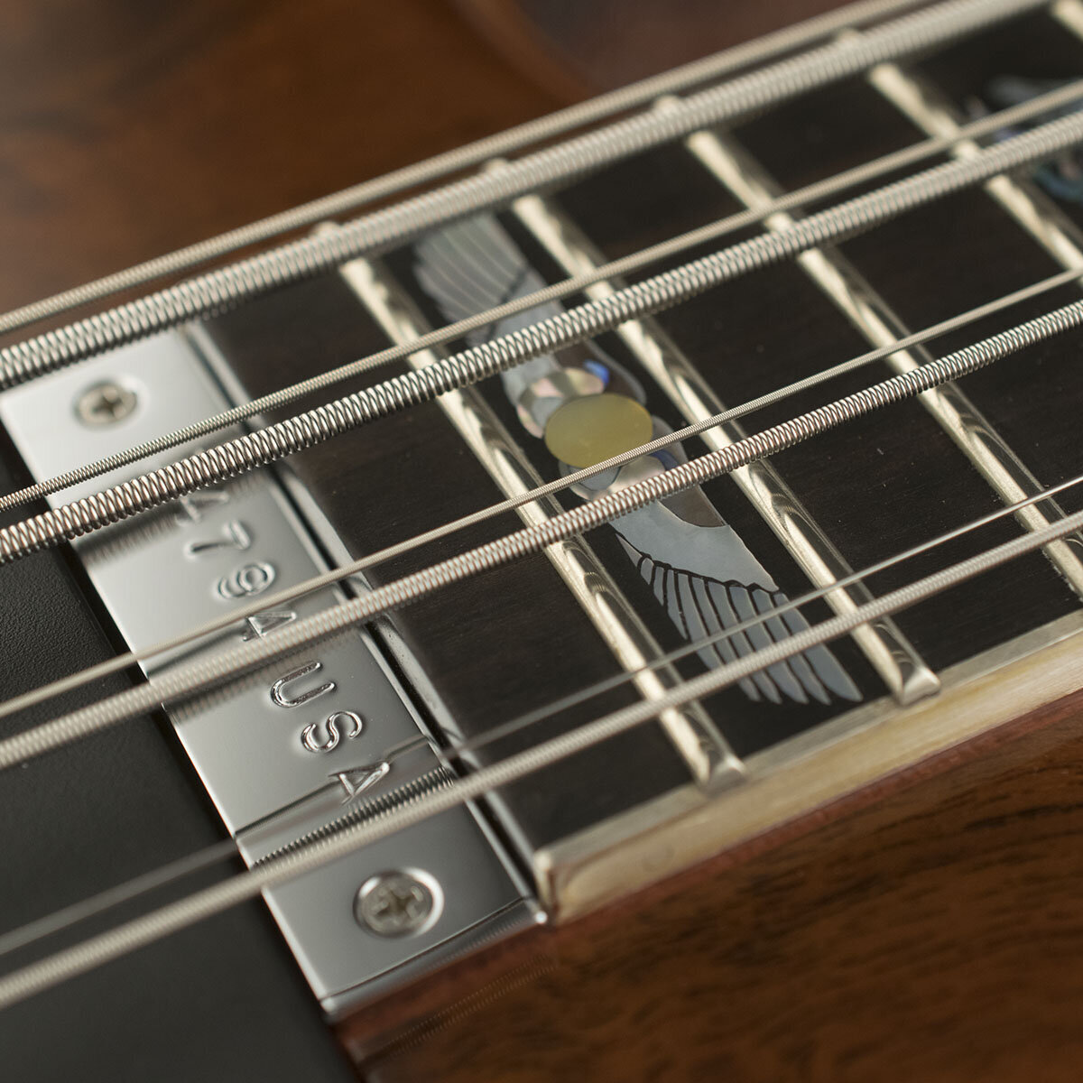 Sterling Silver binding on Ebony fingerboard