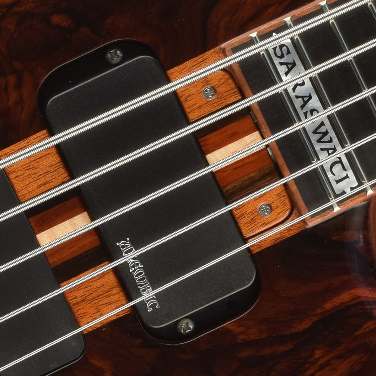 Mahogany, Ebony, Vermilion, and Maple truss rod cover