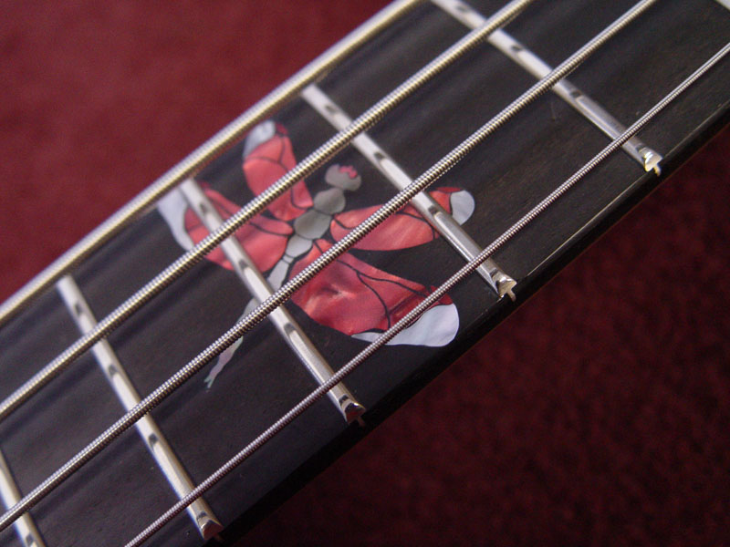 Singapore dragonfly inlay in black and white mother of pearl and red pearloid