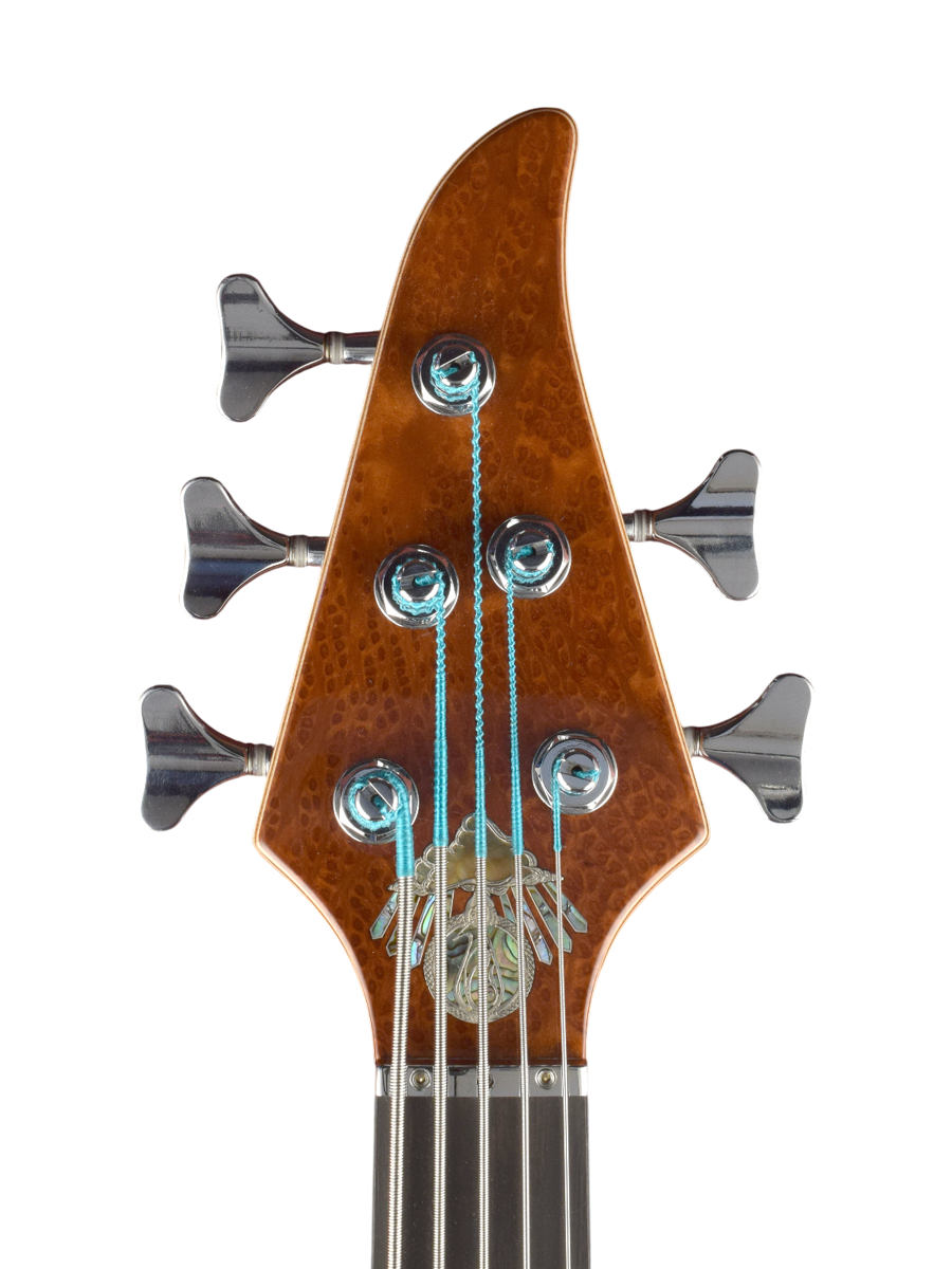 Silver inlaid logo with black mother of pearl and abalone plus silver framed lab opal rays