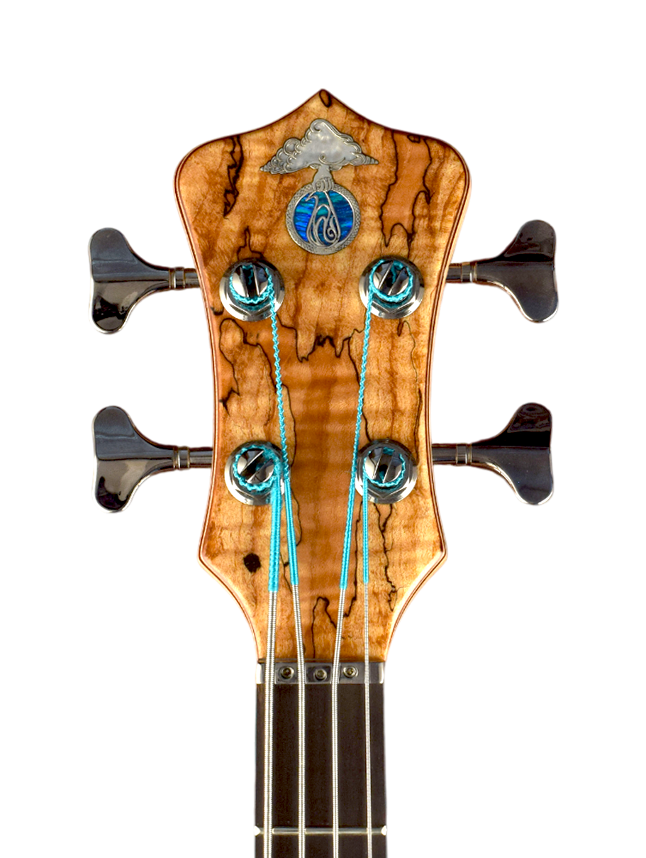 Silver inlaid logo with blue lab opal